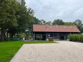 Landelijke gelegen woning voor 6 personen met hottub!，位于Tollebeek的别墅