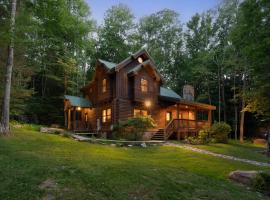 Jamesons Cabin! 8 Minutes to Wisp, HotTub, FirePit, Pets, EV Chgr，位于奥克兰的度假屋