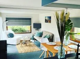 Knus chalet met zwembad en sauna