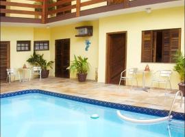 Pousada Solarium UNIDADE 1 ECONOMICA-BÁSICA，位于瓜鲁雅的酒店