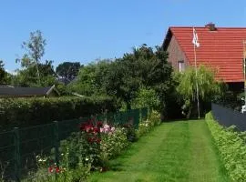 Eule ost und west Ferienhaus im urigen Garten