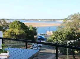 Family Friendly 3 Bedroom - River Views - short walk to the Beach