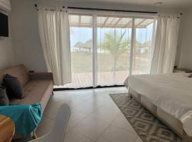 Casa Suite Palmar del viento FRENTE, FRENTE AL MAR，位于Moñitos的酒店