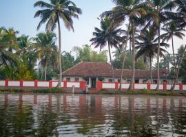 Kuttanad Kayak Club by Lexstays，位于阿勒皮的乡村别墅