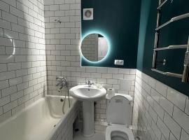 Апартаменти в центрі на Подільській，位于赫梅利尼茨基的自助式住宿