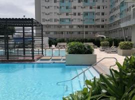 2BR Cozy Seaside Condo in Dumaguete，位于杜马格特的海滩短租房