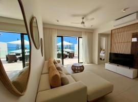 Exclusive beachfront penthouse，位于贝尔马尔的酒店