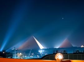 Grand Pyramids In，位于Giza的旅馆