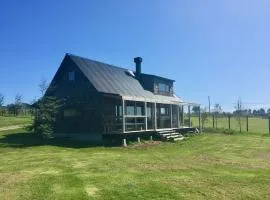 Cabaña con chimenea en Pto Varas