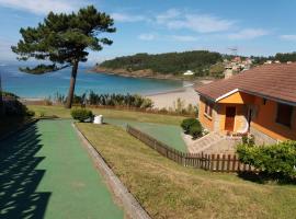 Chalet sobre playa canelas, EN SANXENXO，位于桑亨霍的别墅