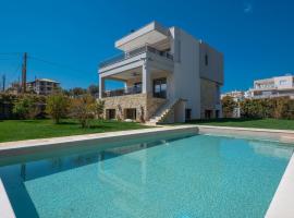 Sea Wind Luxury Villa with Private Heated Pool Kassandra Halkidiki，位于诺亚福克的度假屋