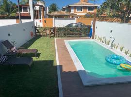 Casa 4 suítes com piscina Condomínio Lagoa Dourada Ilha de Itaparica BA，位于伊塔帕里卡的酒店