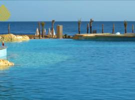 Oyster Bay Resort, One Bedroom Beach Front Apartment, Marsa Alam，位于阿布达巴的度假短租房