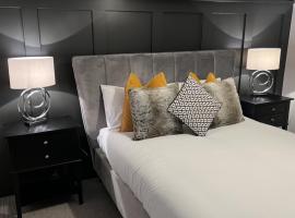 Wolf Inn Serviced Accommodation，位于洛斯托夫特的公寓