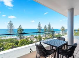 迎风公寓酒店，位于穆卢拉巴的酒店