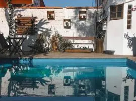 Casa grande,3 min a pé do Centro, grupos, familias