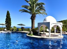 Seven Senses Luxury Hilltop villa with sea views，位于圣埃乌拉利亚的酒店
