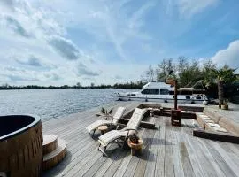 NEW - LITTLE IBIZA, on a lake near Amsterdam, with HOT TUB!