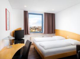 Mainstreet Hotel，位于迪岑巴赫的酒店