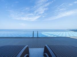 Gangneung Chonpines Ocean Suites Hotel，位于江陵市的酒店