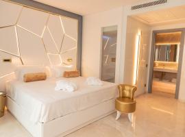 The Promenade Luxury Wellness Hotel，位于里乔内的带按摩浴缸的酒店