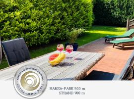 FeWo SONNENDECK Familien-strandnah-Garten-Hunde-Sport-und Schwimmbadnah-HansaPark，位于希尔克道夫的公寓