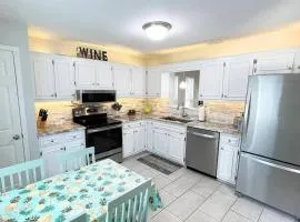 Three Bedrooms Two and half baths end unit few blocks from beach