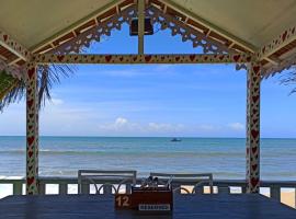 Nasya's Beach Side Cottages，位于比纳里姆的酒店