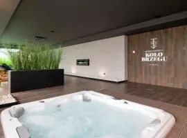 Apartamenty KOŁO BRZEGU Sauna i Jacuzzi Kołobrzeg by Renters