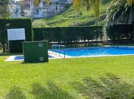 Piscina comunitaria y parking en Mogro