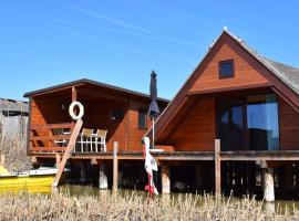 Chalet im See - Nr 51，位于拉斯特的木屋