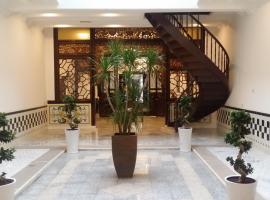 希伦棕榈套房酒店，位于马六甲的酒店