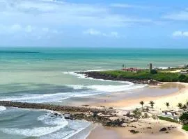 Apartamento em Areia Preta com vista para o mar