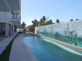 Condo vista al mar, alberca rooftop Chixchulub，位于希克苏鲁伯的公寓