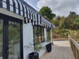 Tiny house with greenhouse dining