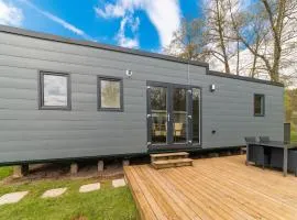 Spacious mobile home with terrace, near a brook