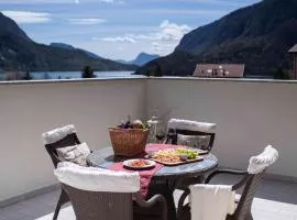 Attico con vista sul lago e montagne a Molveno