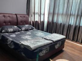 Sandakan Homestay IJM Condo 3R2B Serenity Lodge 明悦之居 - 7 Pax，位于Bandar Indah的木屋