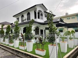 Villa President Homestay -4 bedroom Aircond WIFI Vacations Home，位于Kampung Kerangi的度假短租房