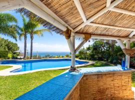 Villa Cabopino - Golfside Villa with Spectacular Ocean Views，位于米哈斯科斯塔的酒店