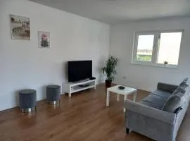 Neubau Appartement mit Terasse, privater Eingang,Parkplatz,Küche