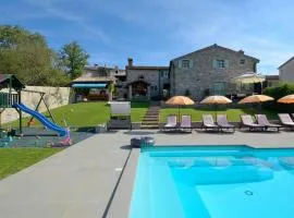 Estate with four stone villas and swimming pool in Buzet