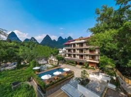 Yangshuo River Lodge Hotel-Free pick up from Yangshuo Area over three nights，位于阳朔的酒店