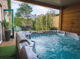 Luxe Veluws Vakantiehuis met JACUZZI，位于卢特伦的酒店