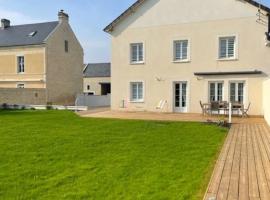 Maison au sein d’un corps de ferme.