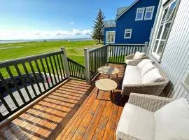 A New house that is a mix of an Historic House ( Torfhildur Hólms House ) and a new building in heart of Reykjavik on 3 levels