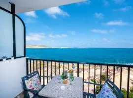 Islet Promenade Seafront 1 Bedroom Apartment with 2 seaview balconies by Getawaysmalta