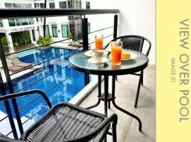 Stylish 2-bedroom Condo w. Pool View