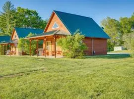 Lakefront Columbia Cabin with Porch and Shared Dock