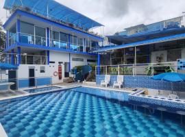 Hotel spa la buena vida，位于富萨加苏加的带泳池的酒店